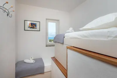 Krevet ili kreveti u jedinici u objektu Andrian Apartment - Charme Holidays