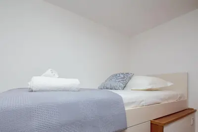 Krevet ili kreveti u jedinici u objektu Andrian Apartment - Charme Holidays