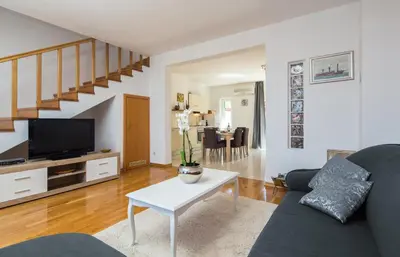 TV i/ili zabavni centar u objektu Andrian Apartment - Charme Holidays