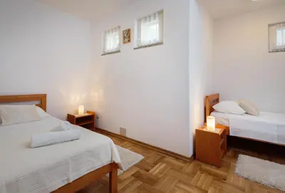 Krevet ili kreveti u jedinici u objektu Roko Apartment - Charme Holidays