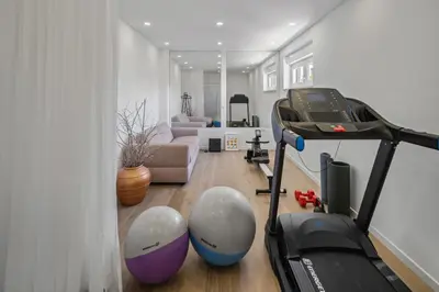 TV i/ili zabavni centar u objektu Luxurious VILLA LAPIS - heated pool, sauna, gym and spa, 120m to sandy beach