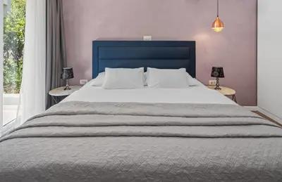 Krevet ili kreveti u jedinici u objektu Luxurious VILLA LAPIS - heated pool, sauna, gym and spa, 120m to sandy beach