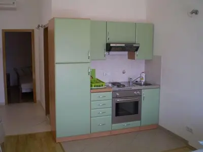Kuhinja ili čajna kuhinja u objektu Apartment in Duce with sea view, balcony, air conditioning, WiFi 5060-2