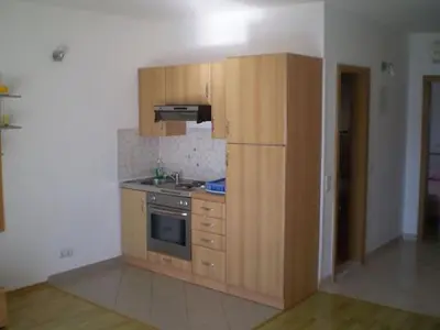 Kuhinja ili čajna kuhinja u objektu Apartment in Duce with sea view, balcony, air conditioning, WiFi 5060-3