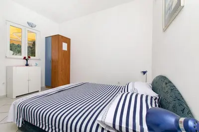 Krevet ili kreveti u jedinici u objektu Apartments Kirigin