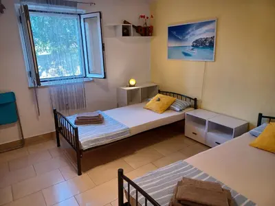Krevet ili kreveti u jedinici u objektu Apartment in Villa Tamara -Pool beheizt ,Meerblick