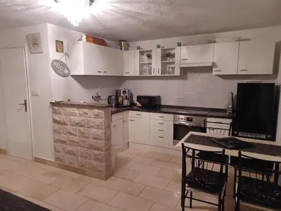 Kuhinja ili čajna kuhinja u objektu Apartment in Villa Tamara -Pool beheizt ,Meerblick