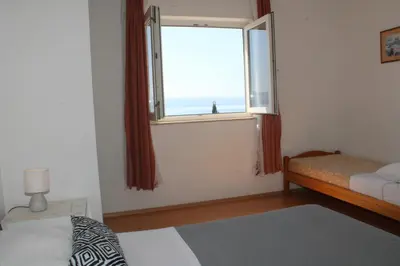 Krevet ili kreveti u jedinici u objektu Apartment in Duce with sea view, balcony, air conditioning, W-LAN 5067-2