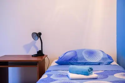 Krevet ili kreveti u jedinici u objektu CARTOLINA DI MARE