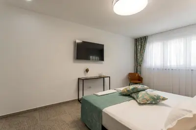 Krevet ili kreveti u jedinici u objektu Luxe villa with pool, jacuzzi, and sauna