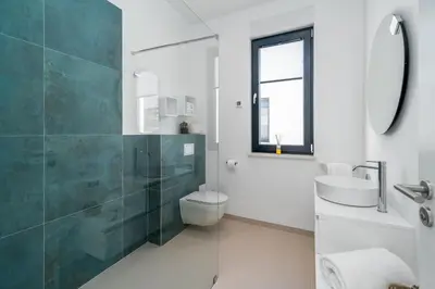 Kupaonica u objektu Villa Lemon, 3 Bedrooms, 4 Baths, Infinity Pool, Whirlpool, Cinema room, Sea view