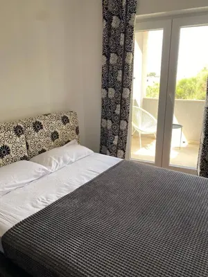 Krevet ili kreveti u jedinici u objektu Apartment Bol A6 with Pool from 45 EUR per Person
