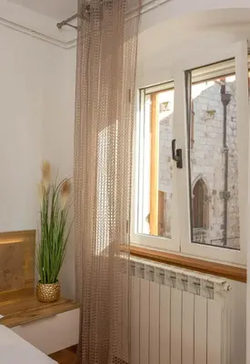 Krevet ili kreveti u jedinici u objektu Deluxe Dreamy room in the Center of Hvar with Sea View