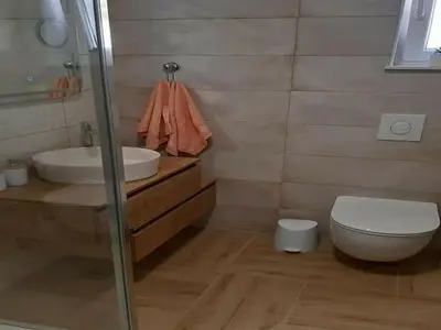 Kupaonica u objektu Apartments Dobrila