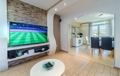 TV i/ili zabavni centar u objektu Amazing Home In Milna