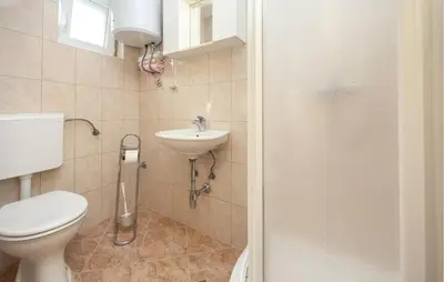 Kupaonica u objektu Apartment Vojskovo Ii