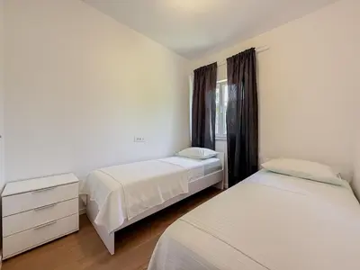 Krevet ili kreveti u jedinici u objektu Apartments Piscina-Grey