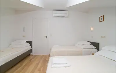 Krevet ili kreveti u jedinici u objektu 3 Bedroom Lovely Apartment In Omis