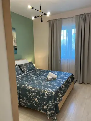 Krevet ili kreveti u jedinici u objektu Apartment Garden