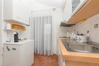 Kuhinja ili čajna kuhinja u objektu Apartment Piccolo Paradiso