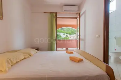 Krevet ili kreveti u jedinici u objektu Near The Beach Brela Apartments Ruzze