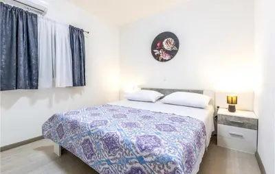 Krevet ili kreveti u jedinici u objektu Lovely Home In Jesenice Dugi Rat
