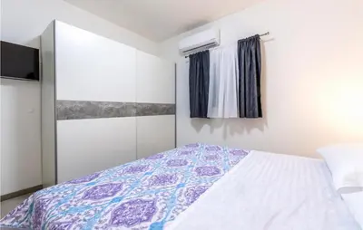 Krevet ili kreveti u jedinici u objektu Lovely Home In Jesenice Dugi Rat