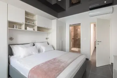 Krevet ili kreveti u jedinici u objektu Beachfront Holiday Home - Private Heated Pool