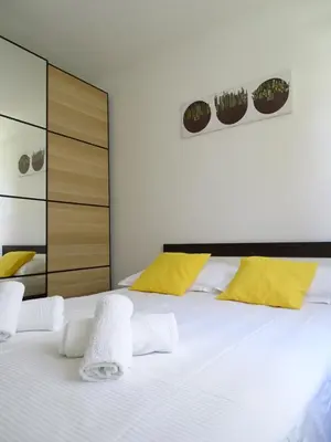 Krevet ili kreveti u jedinici u objektu 4pax Apartment ON THE BEACH with garden, sea view, terrace & parking - Ap A1