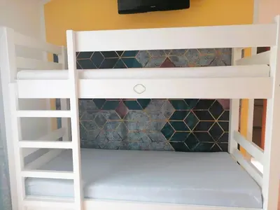 Krevet ili kreveti u jedinici u objektu HAUS AM MEER bei NIKO&ANNA