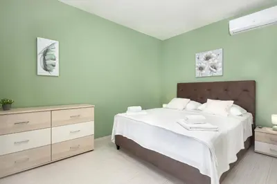 Krevet ili kreveti u jedinici u objektu Guest house LUCIJA with swimming pool