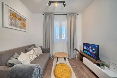 TV i/ili zabavni centar u objektu Relax apartment Split area with jacuzzi and mountain view
