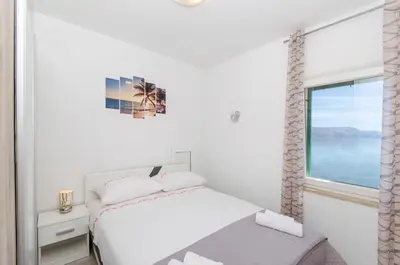 Krevet ili kreveti u jedinici u objektu Apartment Paradise