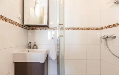 Kupaonica u objektu Villa Kristina - Ferienhaus Baška Voda - Topići, Private Outdoor Swimmingpool