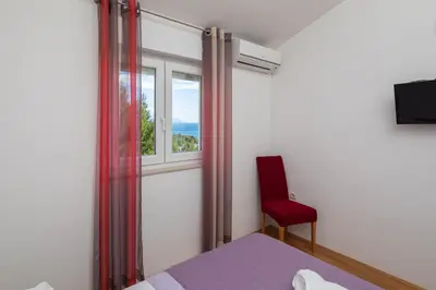 TV i/ili zabavni centar u objektu Seaview Apartment Marita