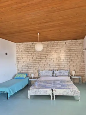 Krevet ili kreveti u jedinici u objektu Gajine apartmani uz more
