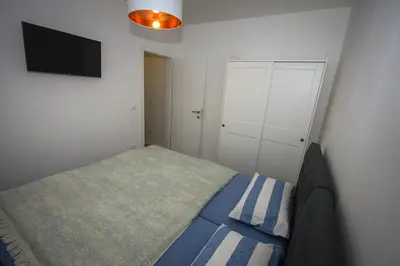 Krevet ili kreveti u jedinici u objektu Deluxe 2 bedroom apartment with sea view