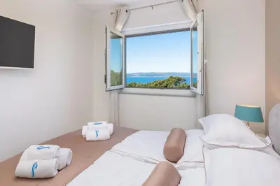 Krevet ili kreveti u jedinici u objektu A&D Deluxe Penthouse Apartment Dani