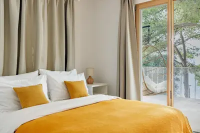 Krevet ili kreveti u jedinici u objektu LUMA HVAR Premium Beachfront Villa 1st Row to Sea