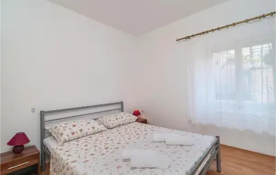 Krevet ili kreveti u jedinici u objektu Holiday Home Pucisca Gospe Lurdske