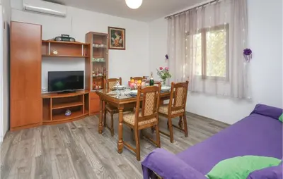 TV i/ili zabavni centar u objektu Holiday Home Gata Ostrvica