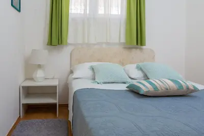 Krevet ili kreveti u jedinici u objektu Terra Beach Apartment