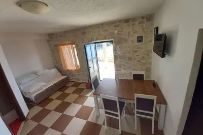 Krevet ili kreveti u jedinici u objektu Robinson Medvidna Hvar Apartments