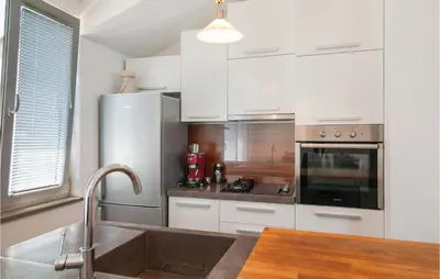 Kuhinja ili čajna kuhinja u objektu Lovely Apartment In Sutivan