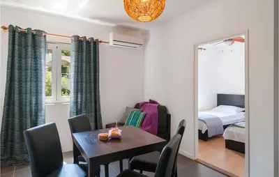 Krevet ili kreveti u jedinici u objektu 2 Bedroom Awesome Apartment In Sutivan