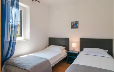 Krevet ili kreveti u jedinici u objektu 2 Bedroom Awesome Apartment In Sutivan