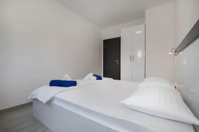 Krevet ili kreveti u jedinici u objektu Apartments BlueView