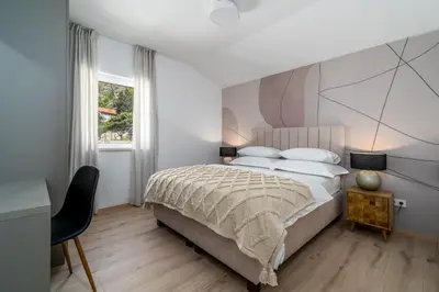 Krevet ili kreveti u jedinici u objektu Villa Atopos with heated private pool, 5 bedrooms, Cinema room, panoramic sea views