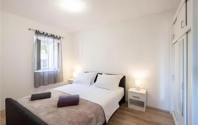 Krevet ili kreveti u jedinici u objektu 3 Bedroom Cozy Home In Povlja