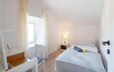 Krevet ili kreveti u jedinici u objektu 3 Bedroom Cozy Home In Povlja